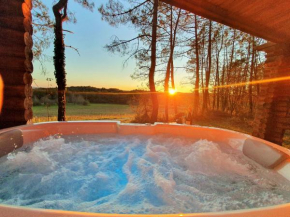 Magnifique chalets en rondins avec ou sans spa et Tipis en plaine Nature Environnement ressourçant au calme vue imprenable Lascaux
